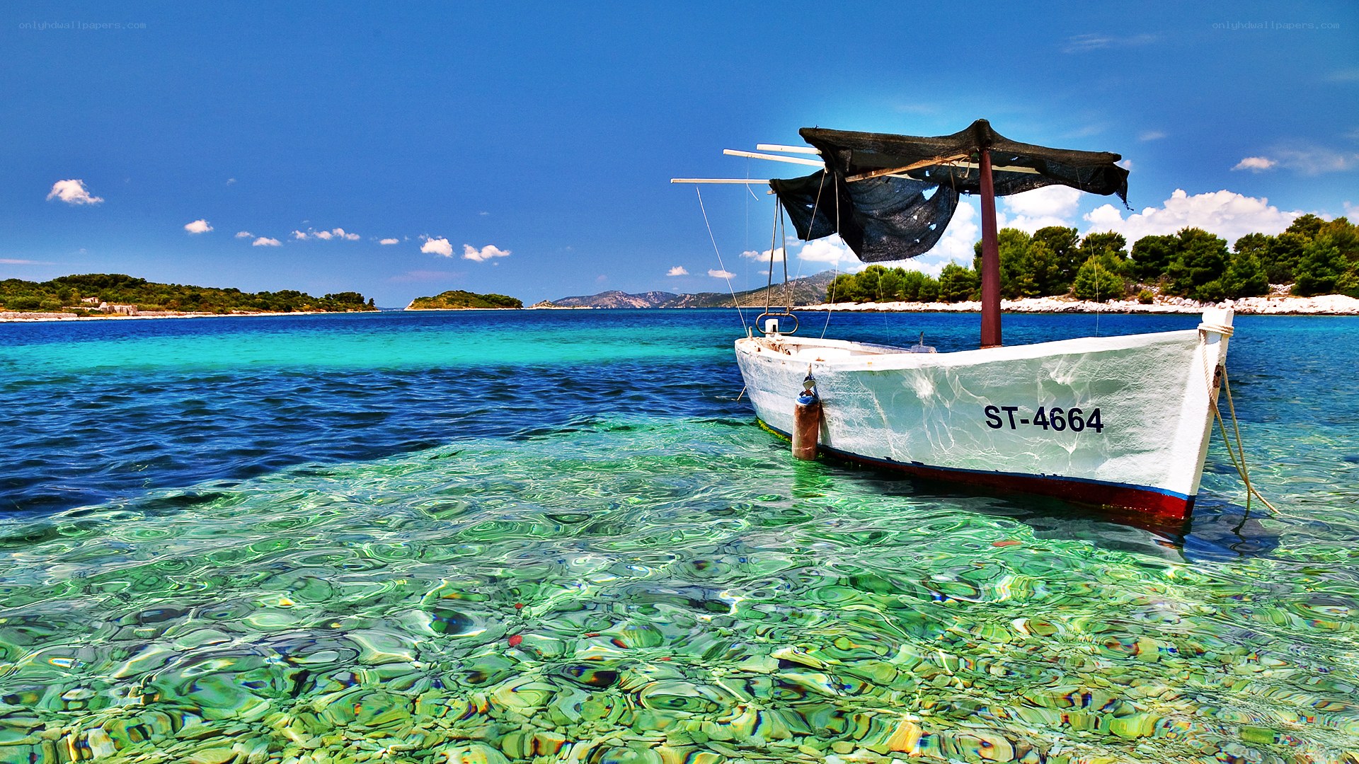 Boat in clear turquoise water