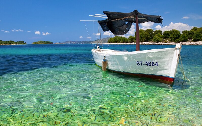 Boat in clear turquoise water