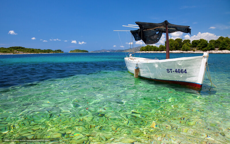 Boat in clear turquoise water