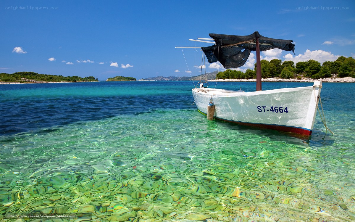 Boat in clear turquoise water