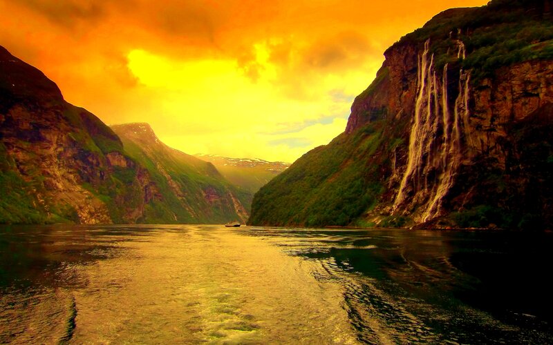 Boat in Fjord at Sunset