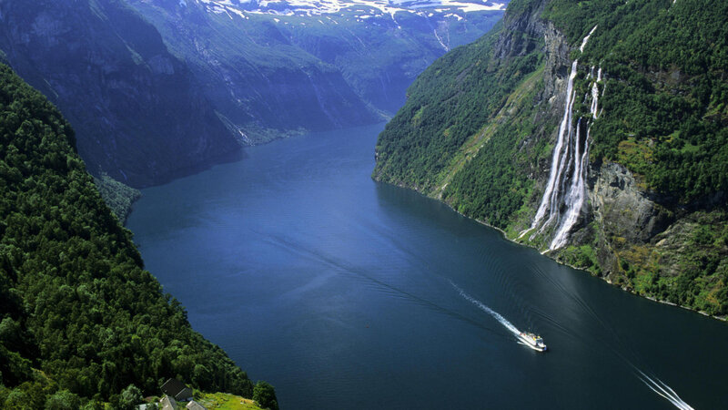 Boat in Fjord with Waterfall