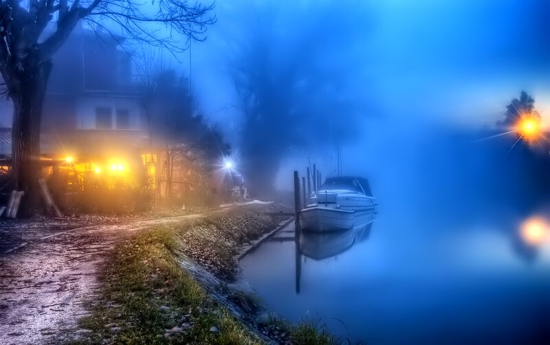 Boat in Foggy Harbor