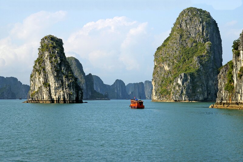 Boat in Limestone Karsts — Blue