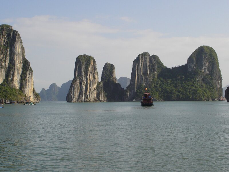 Boat in Limestone Karsts