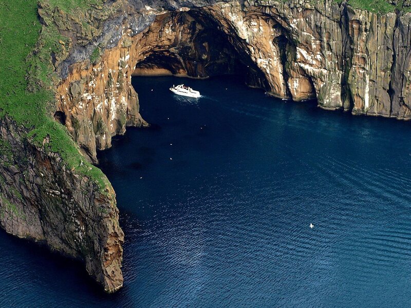 Boat in sea cave