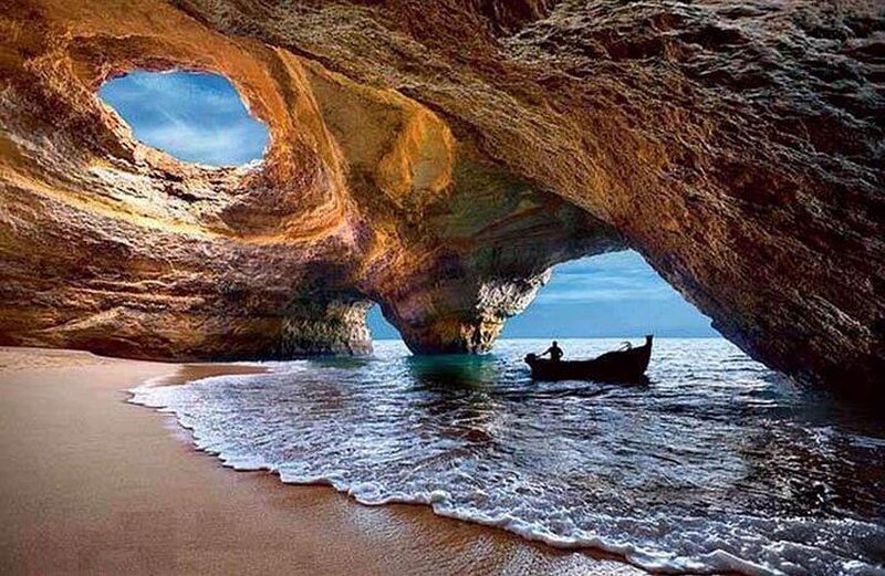 Boat in Sea Cave — Brown