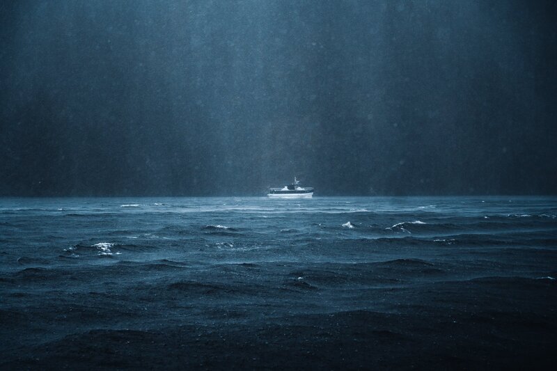 Boat in Stormy Sea — Blue, Dramatic
