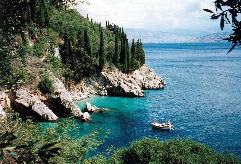 Boat in Turquoise Cove — Blue