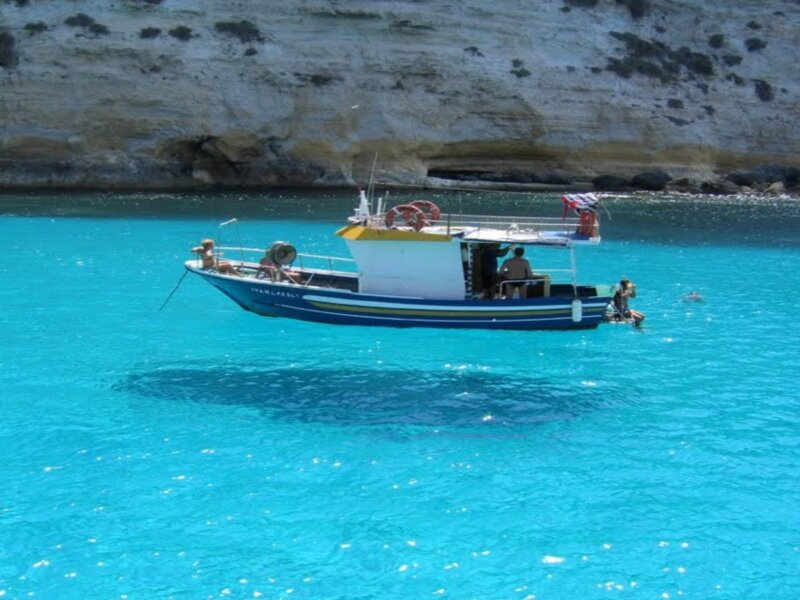 Boat in Turquoise Water — Blue
