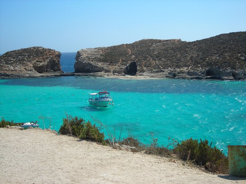 Boat in Turquoise Water — Serene