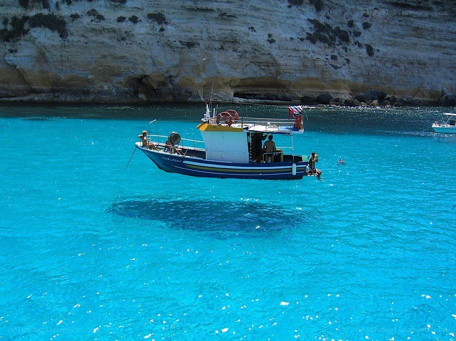 Boat in turquoise water