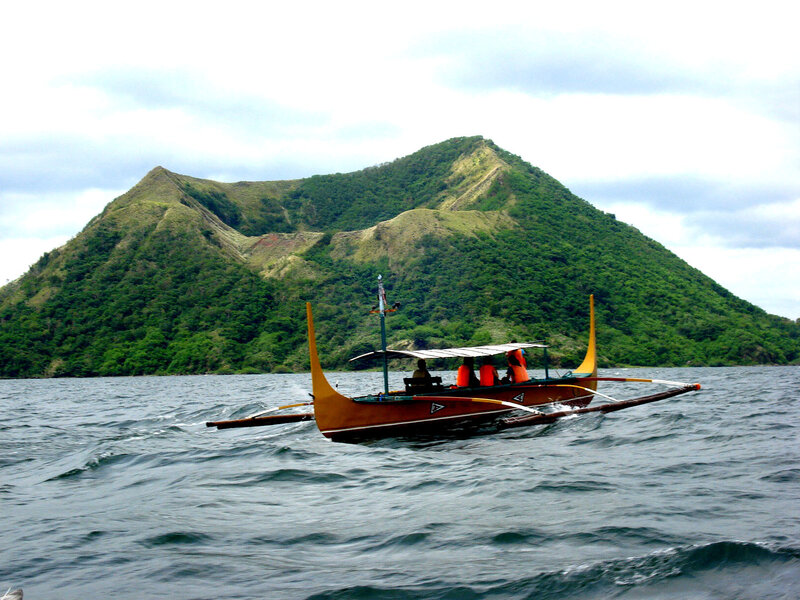 Boat near a volcanic island