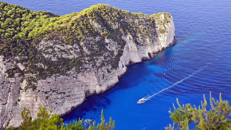Boat Near Cliff — Blue