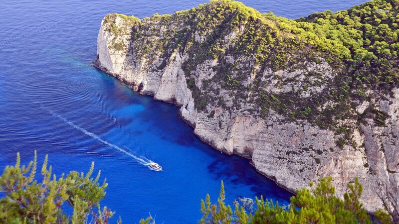Boat Near Cliff