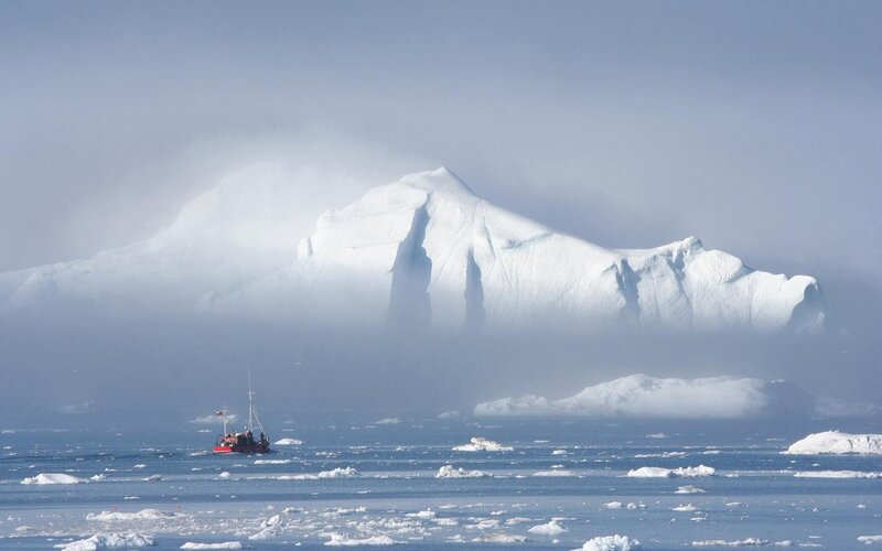 Boat Near Iceberg