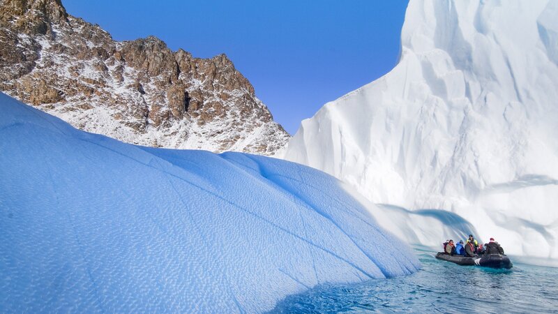 Boat near icebergs in Antarctica