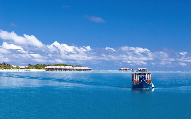 Boat Near Overwater Bungalows