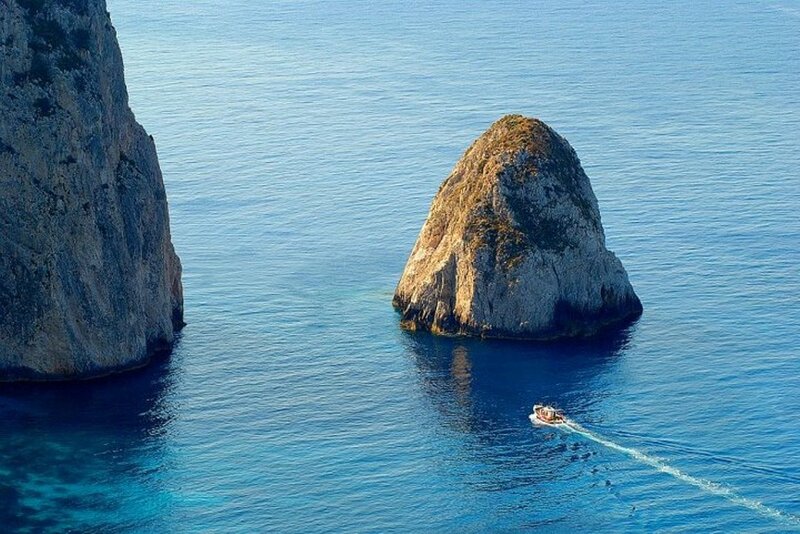 Boat Near Rock Formations