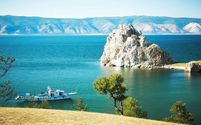 Boat Near Rock Island