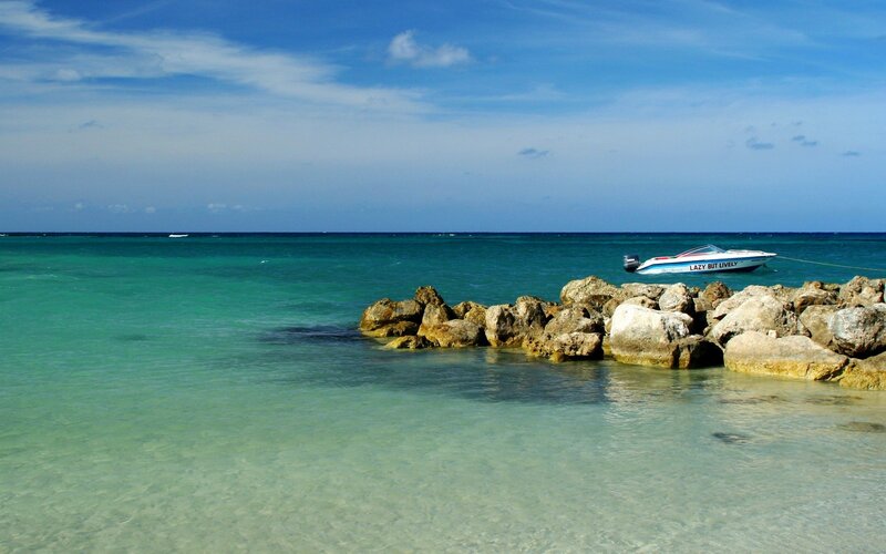 Boat near rocky shore