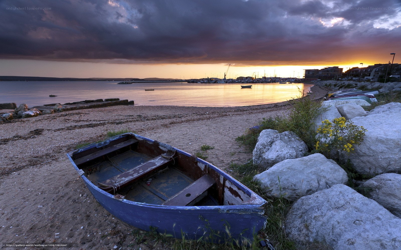 Boat on a beach at sunset