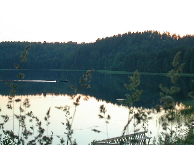 Boat on a calm lake at dusk