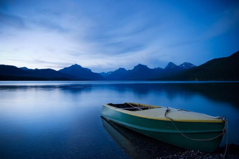 Boat on a calm lake at dusk
