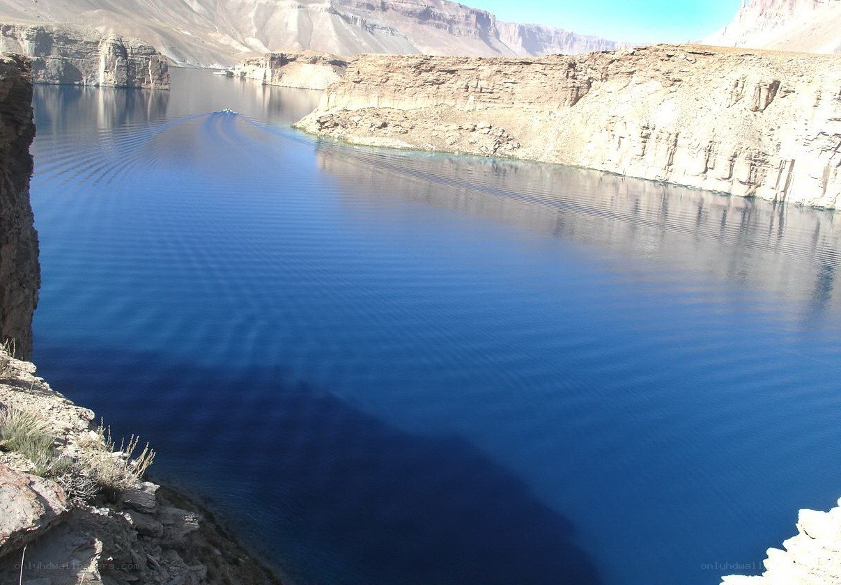 Boat on a deep blue lake