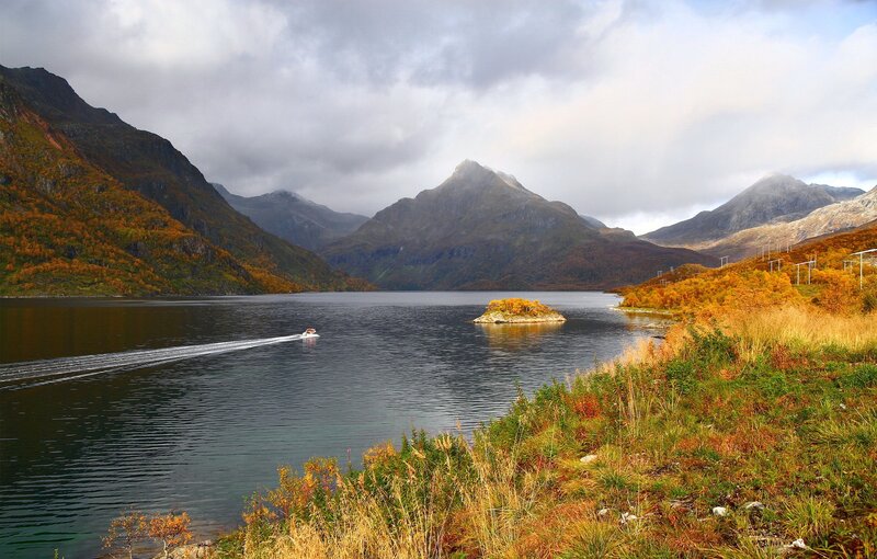Boat on a fjord in autumn