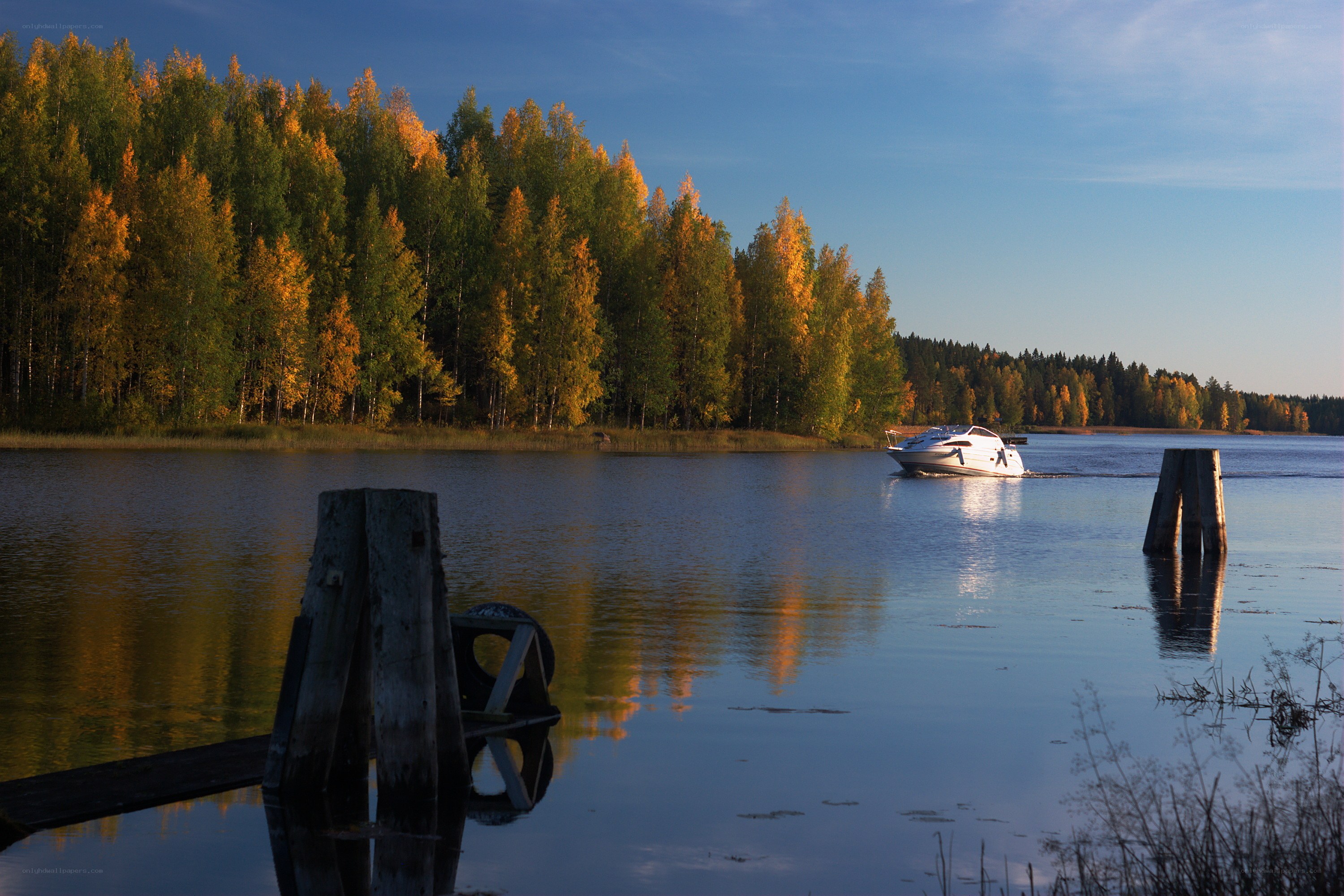 Boat on a lake at sunset