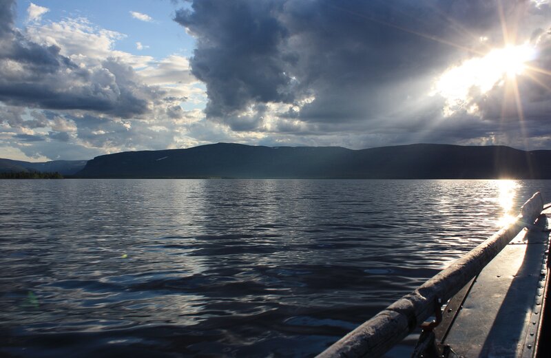 Boat on a Lake — Blue, Dramatic, Sunset