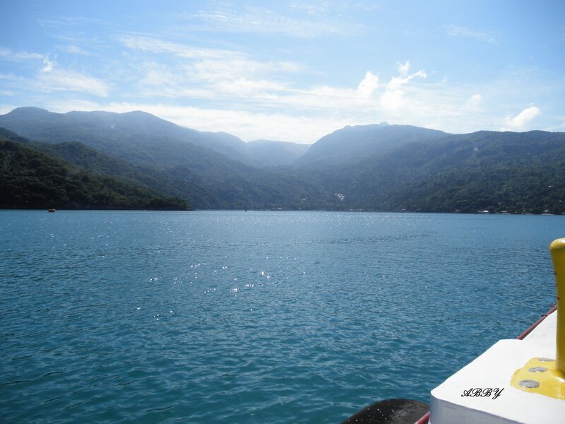 Boat on a Lake — Blue, Serene, Afternoon