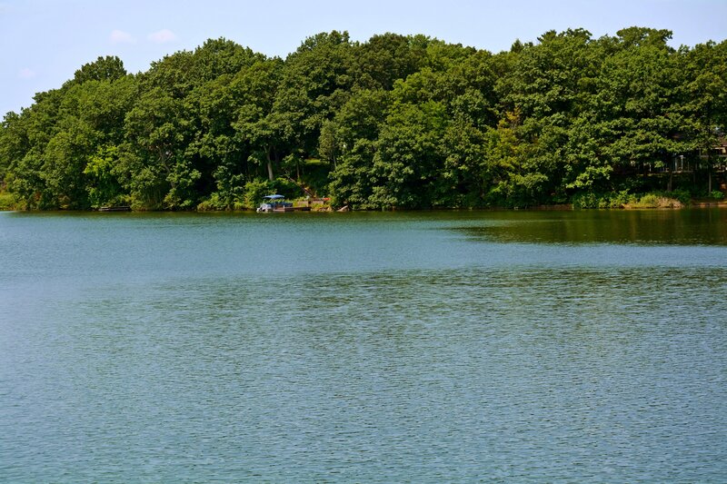 Boat on a Lake — Green, Serene
