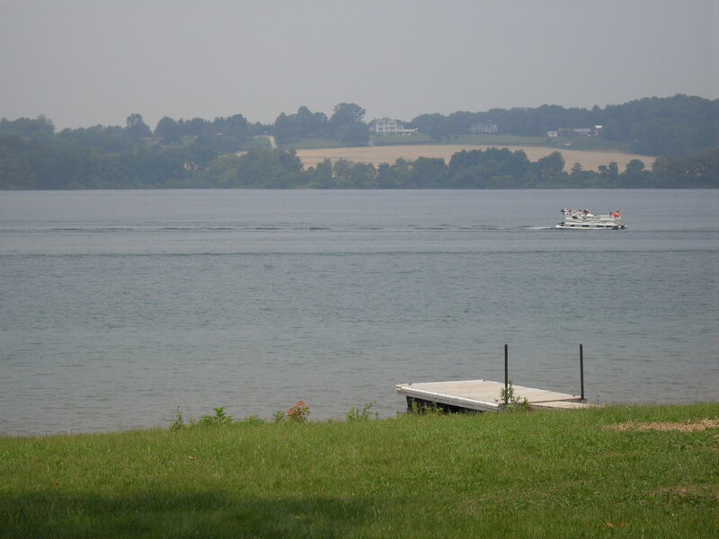 Boat on a lake with dock