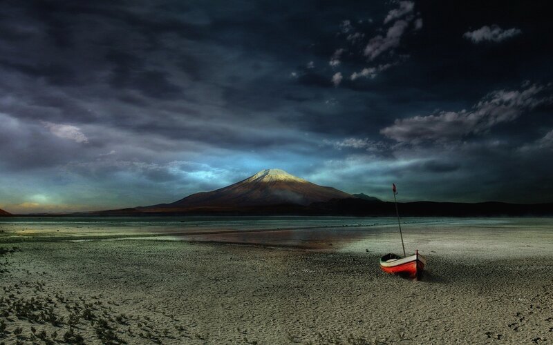 Boat on a lake with mountain