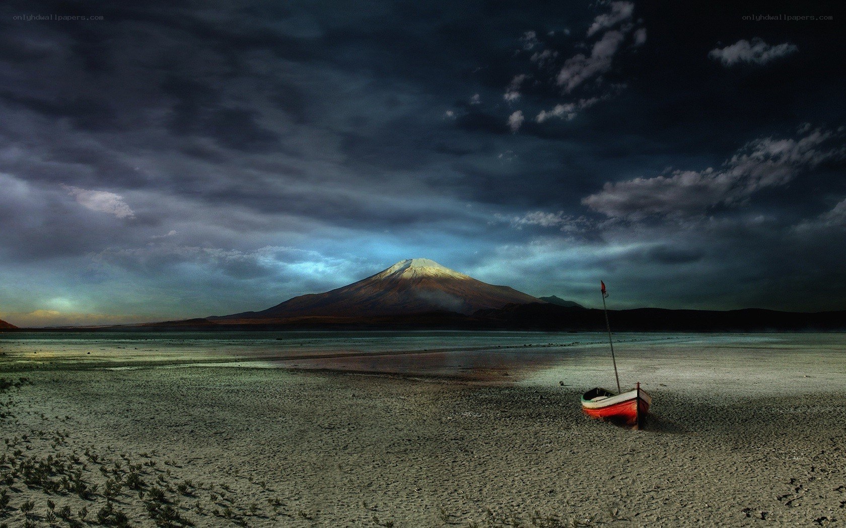 Boat on a lake with mountain