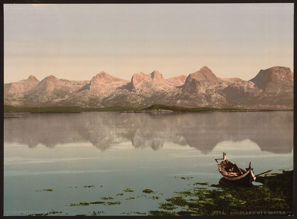 Boat on a lake with mountains