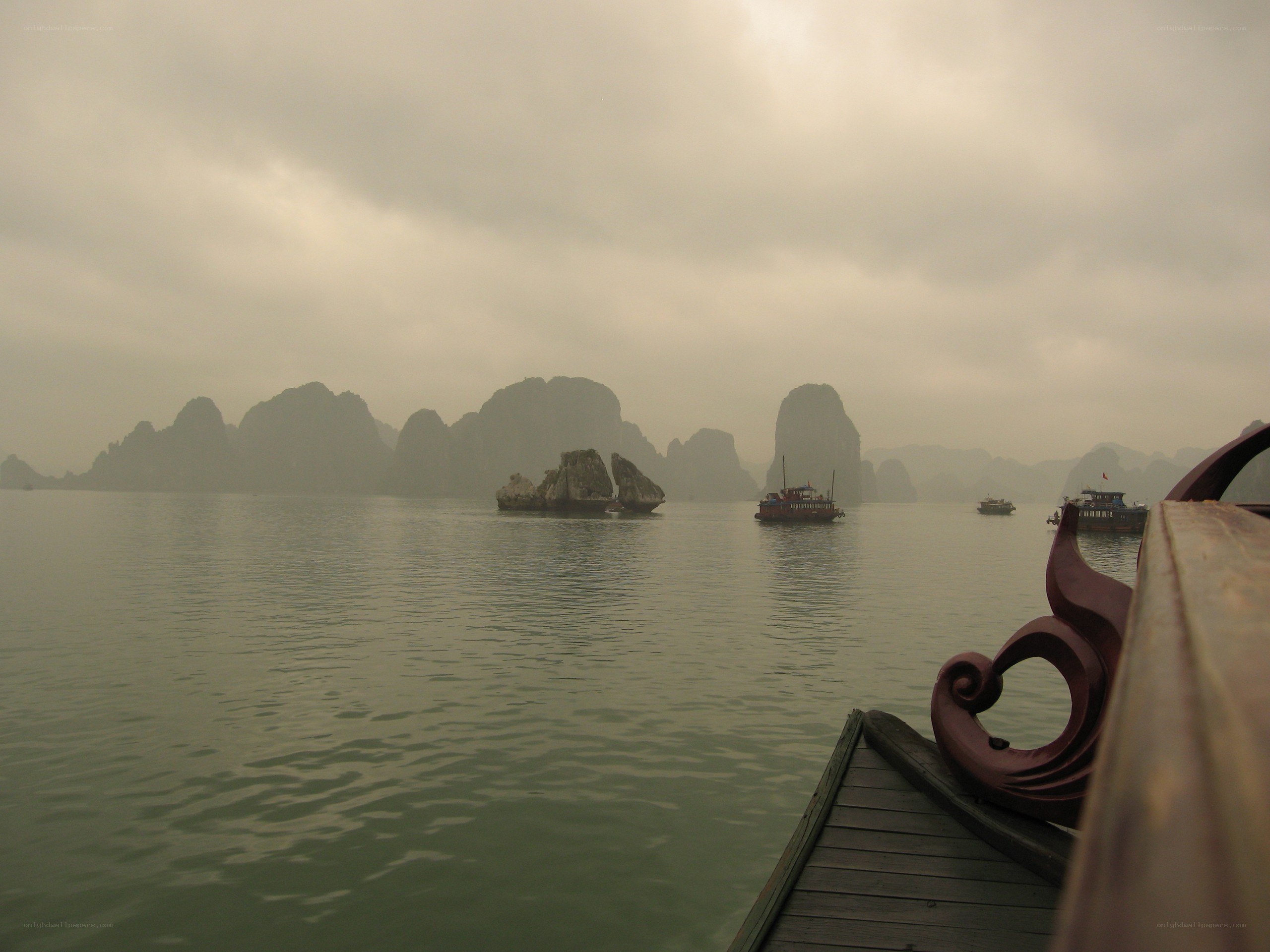Boat on a misty bay