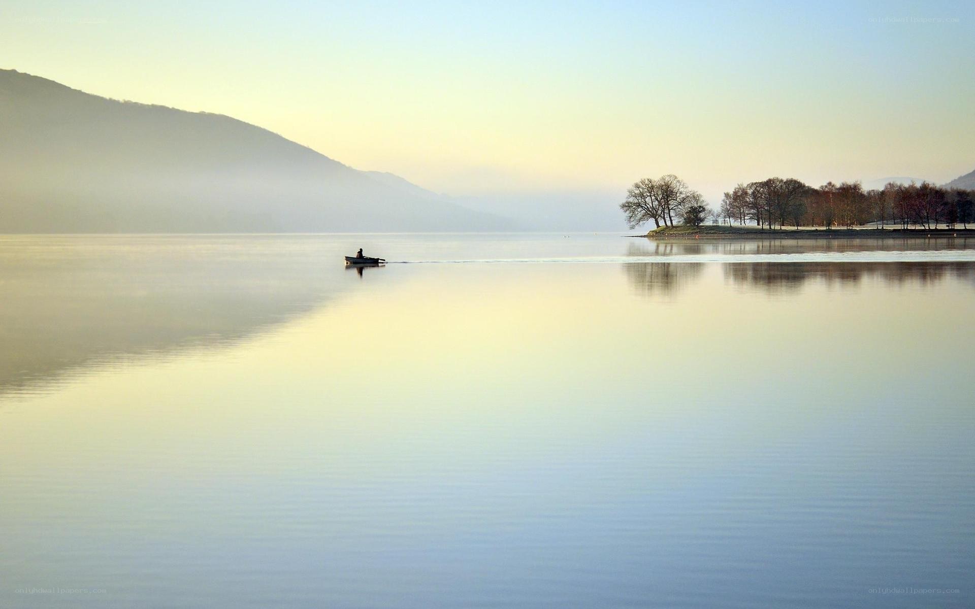 Boat on a misty lake