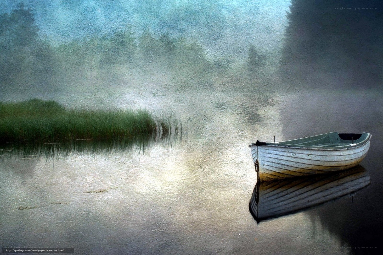 Boat on a misty lake