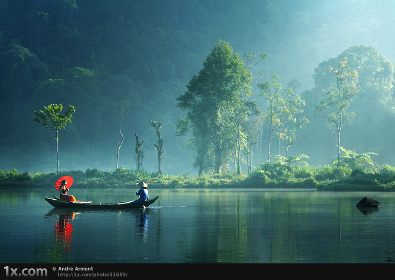 Boat on a misty river