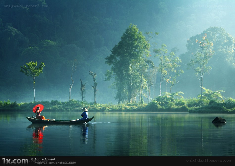 Boat on a misty river
