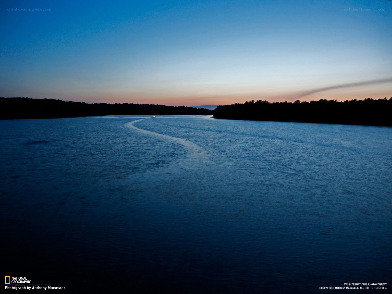 Boat on a river at dusk