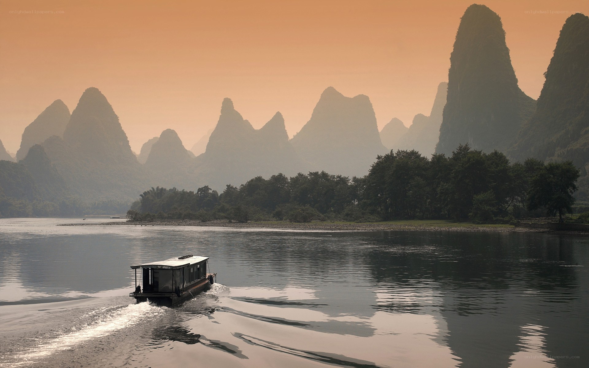 Boat on a river at sunset