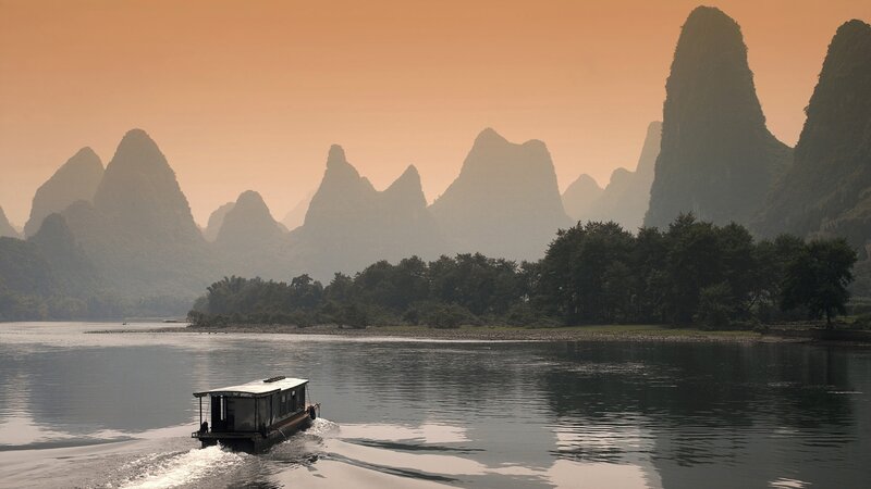 Boat on a river at sunset