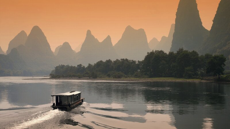 Boat on a river at sunset
