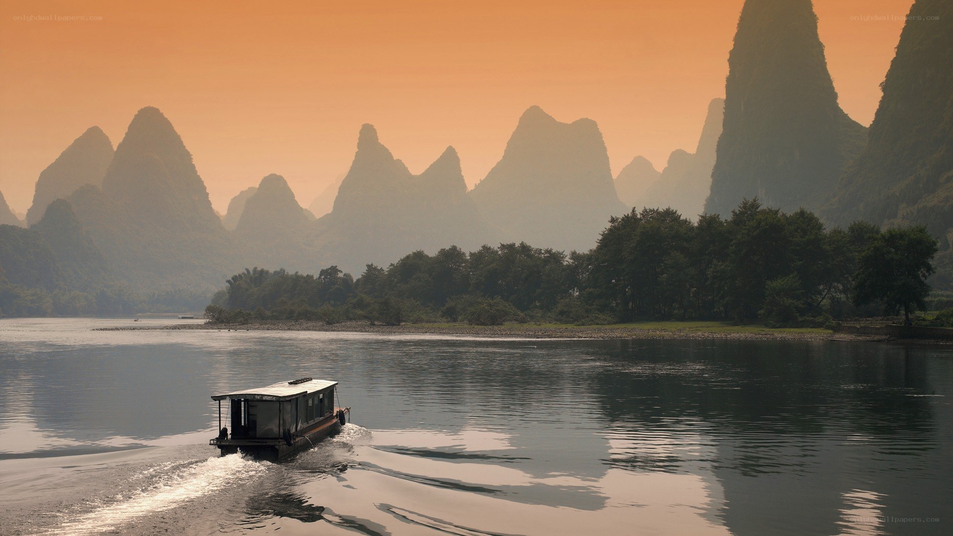 Boat on a river at sunset