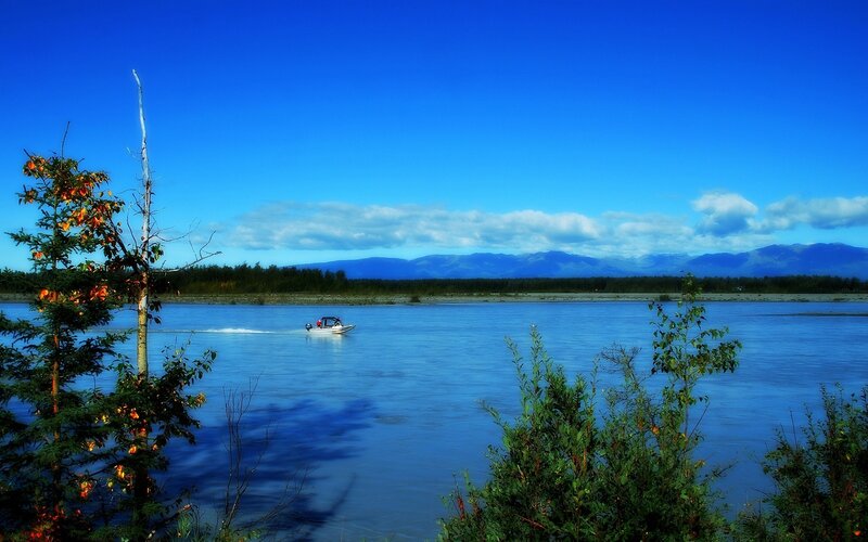 Boat on a River — Blue, Serene, Afternoon, Photograph