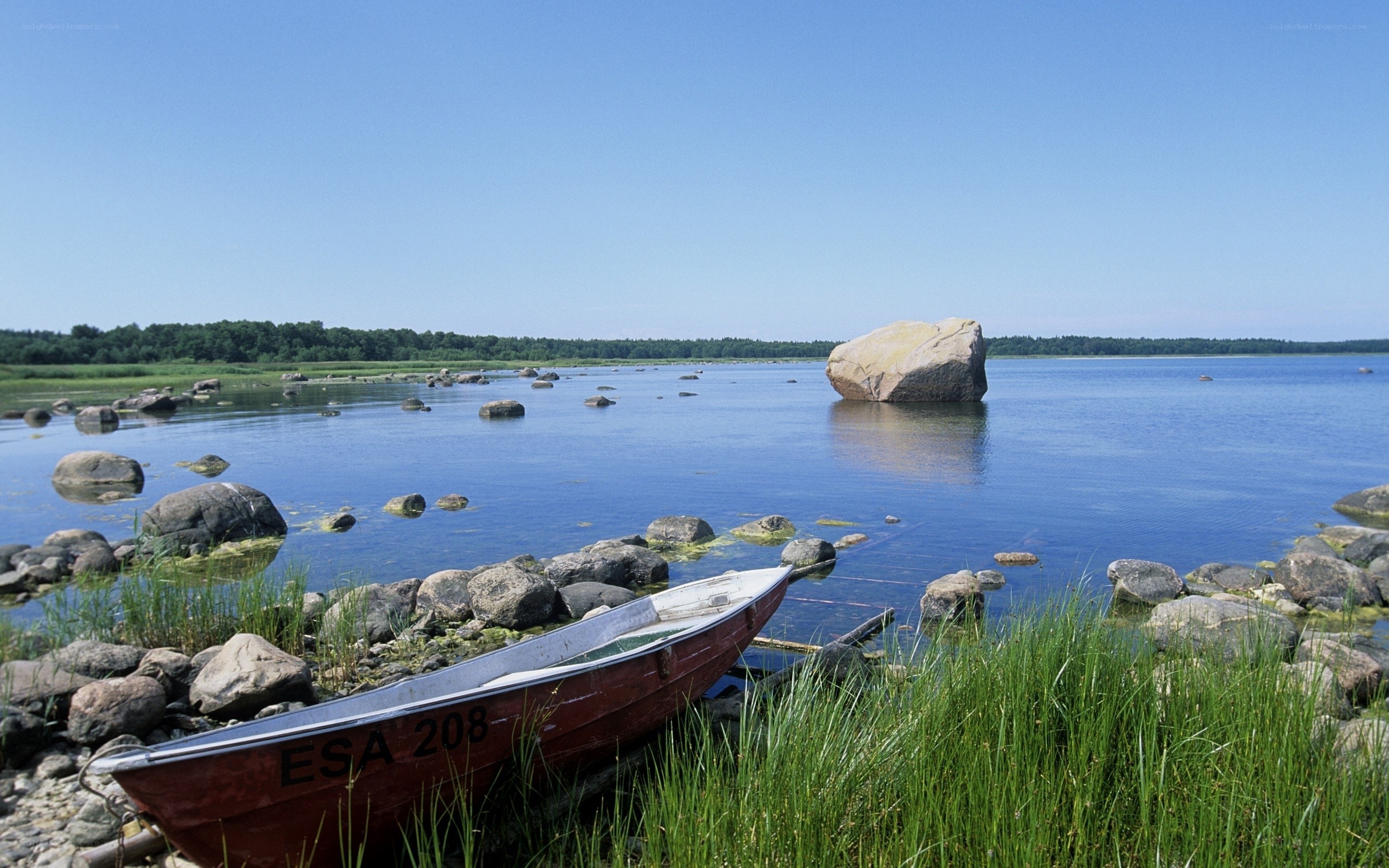 Boat on a rocky lakeshore